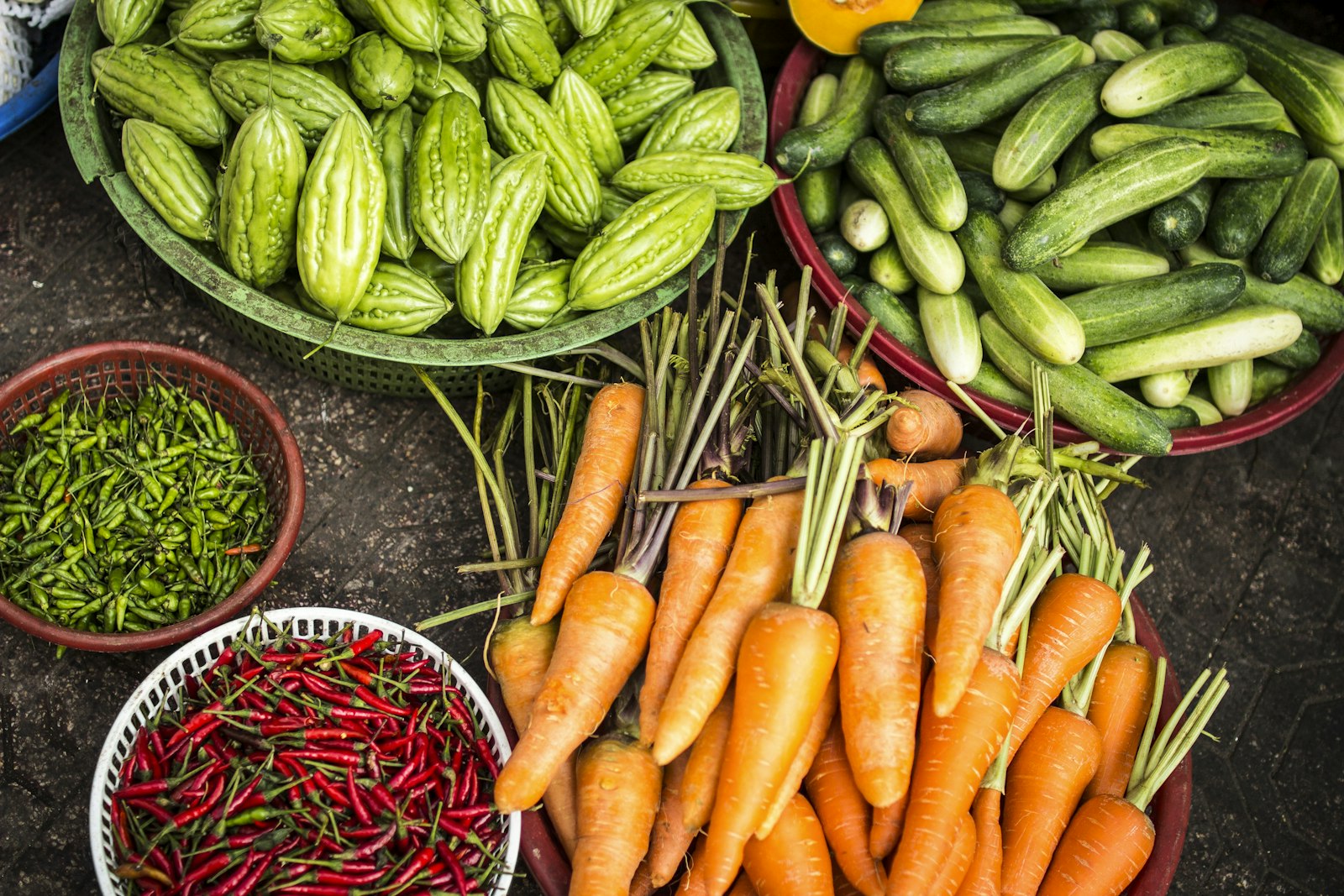 Baskets of vegetables. Illustrative photograph, not a Dishan Farms stall.